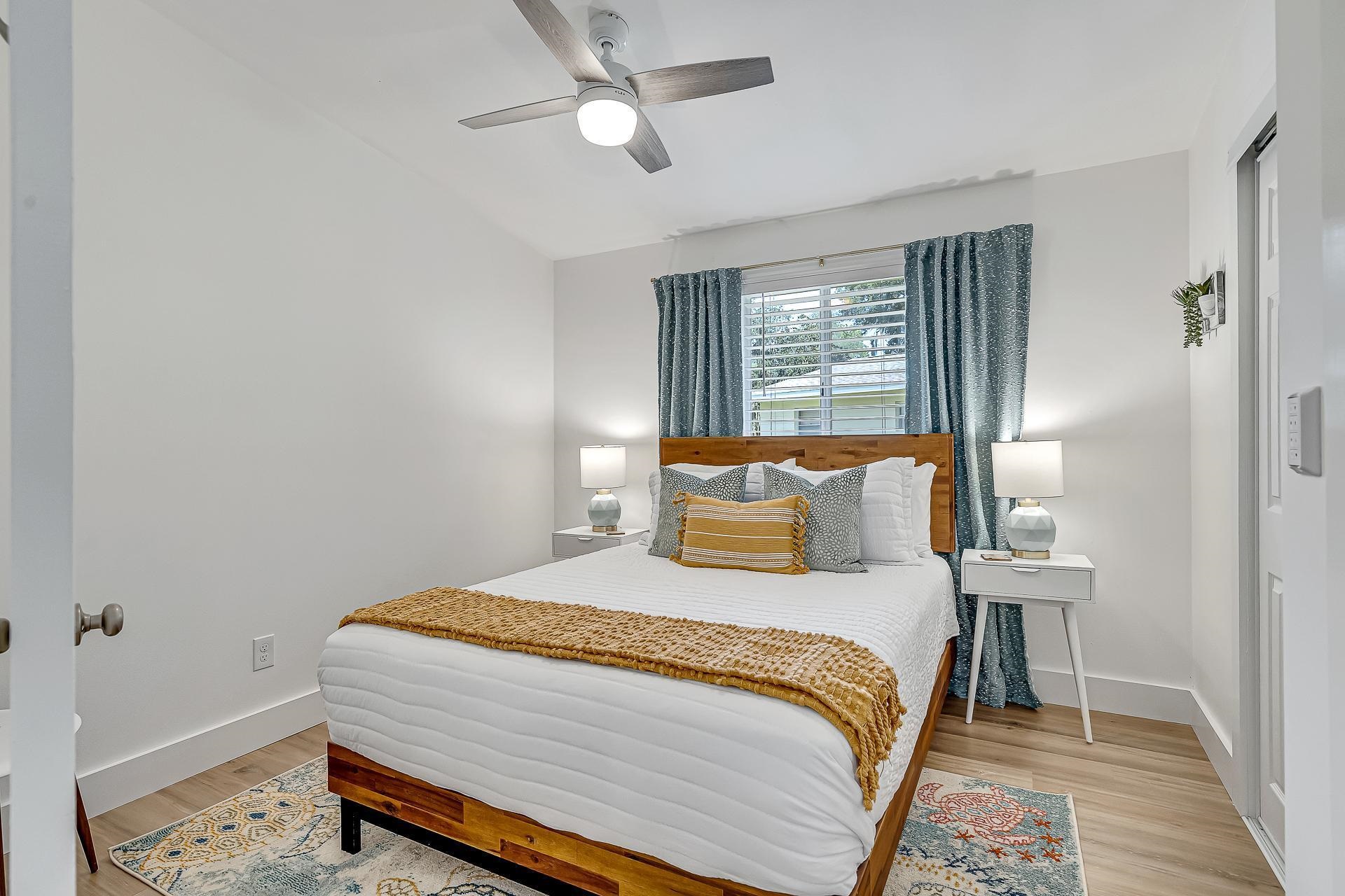 110 Terrapin Road St. Augustine, FL 32086 - Photo 19 of 46 a bedroom with a bed and a window