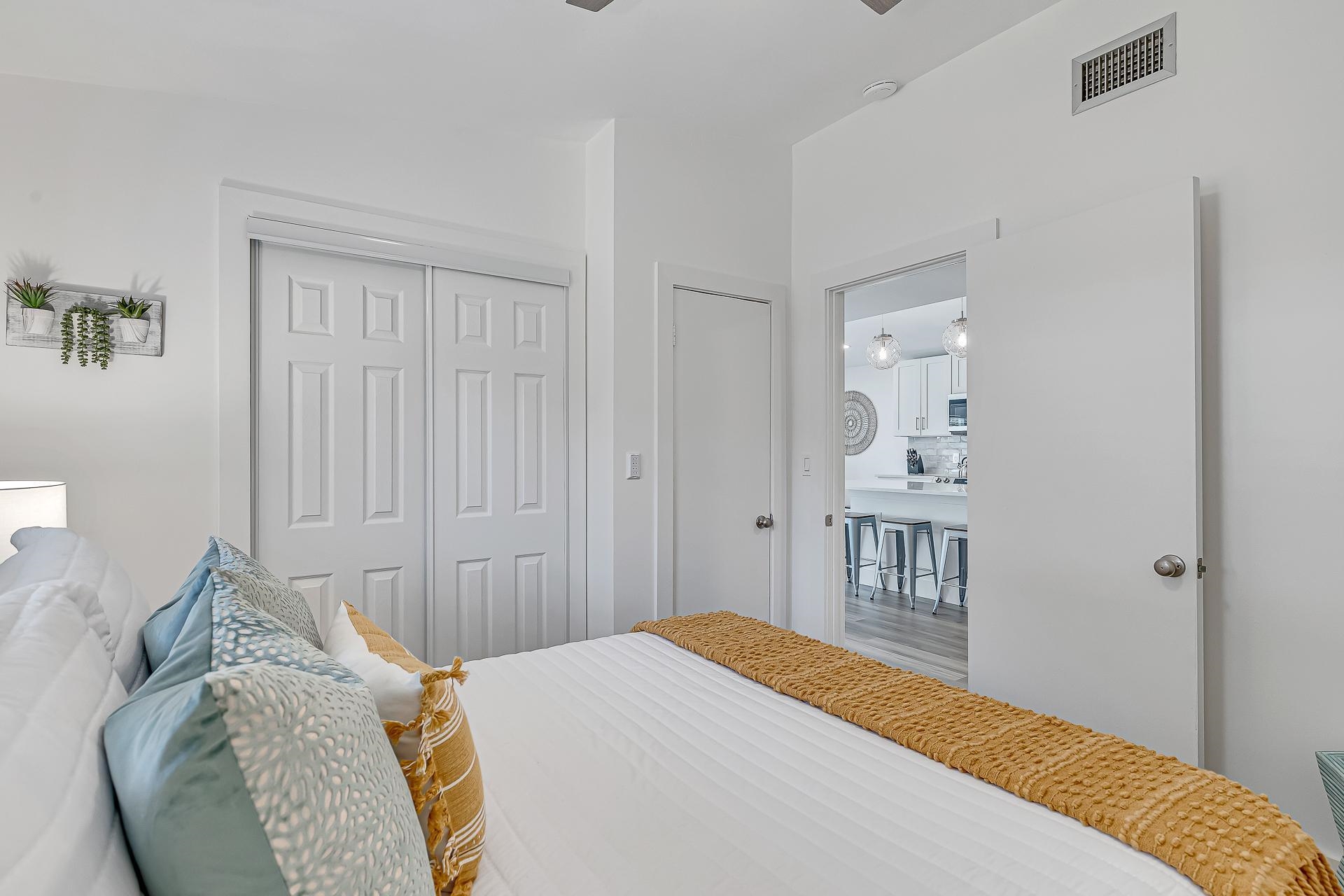 110 Terrapin Road St. Augustine, FL 32086 - Photo 21 of 46 a bedroom with a bed and wooden floor