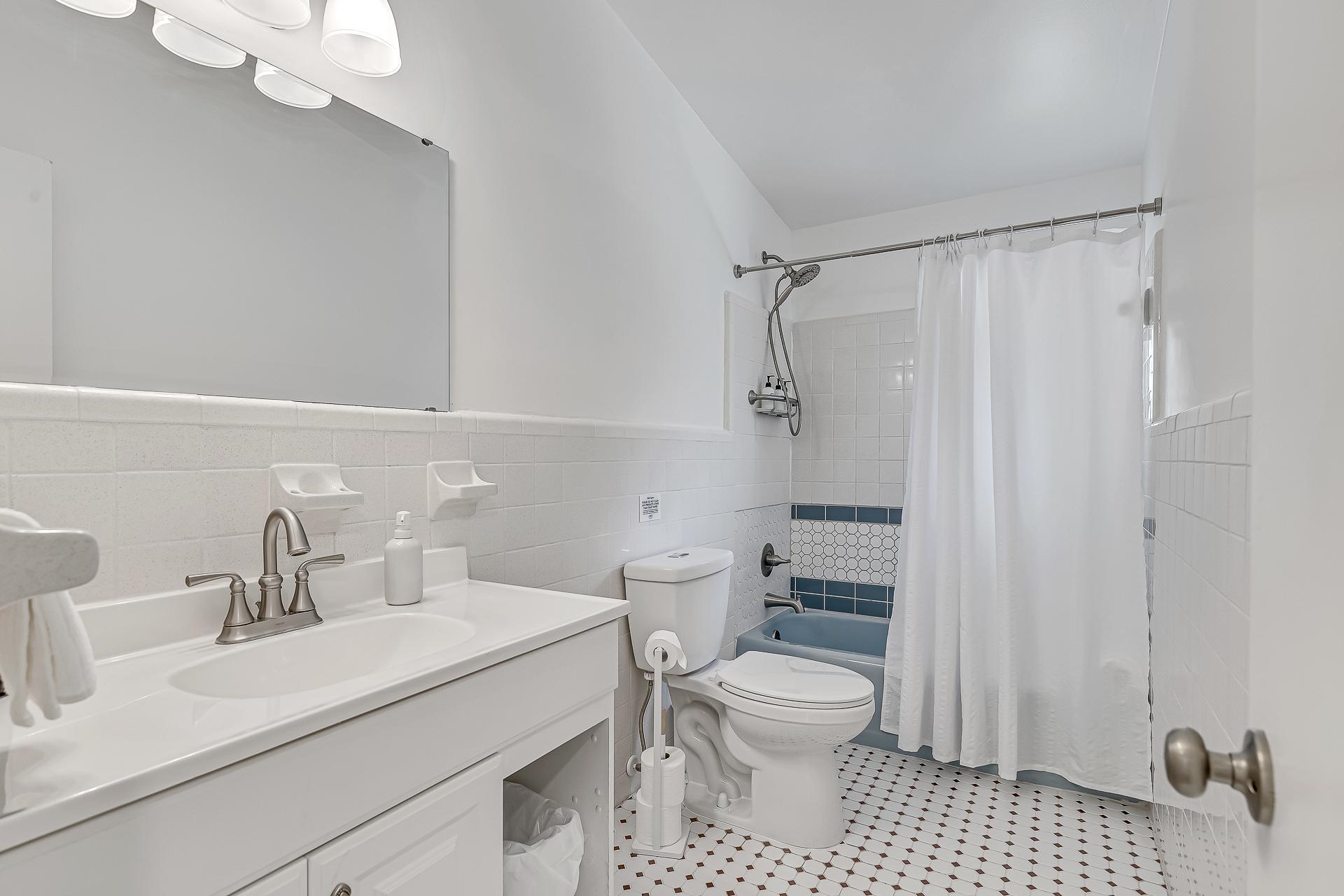 110 Terrapin Road St. Augustine, FL 32086 - Photo 22 of 46 a bathroom with a sink a toilet and a mirror