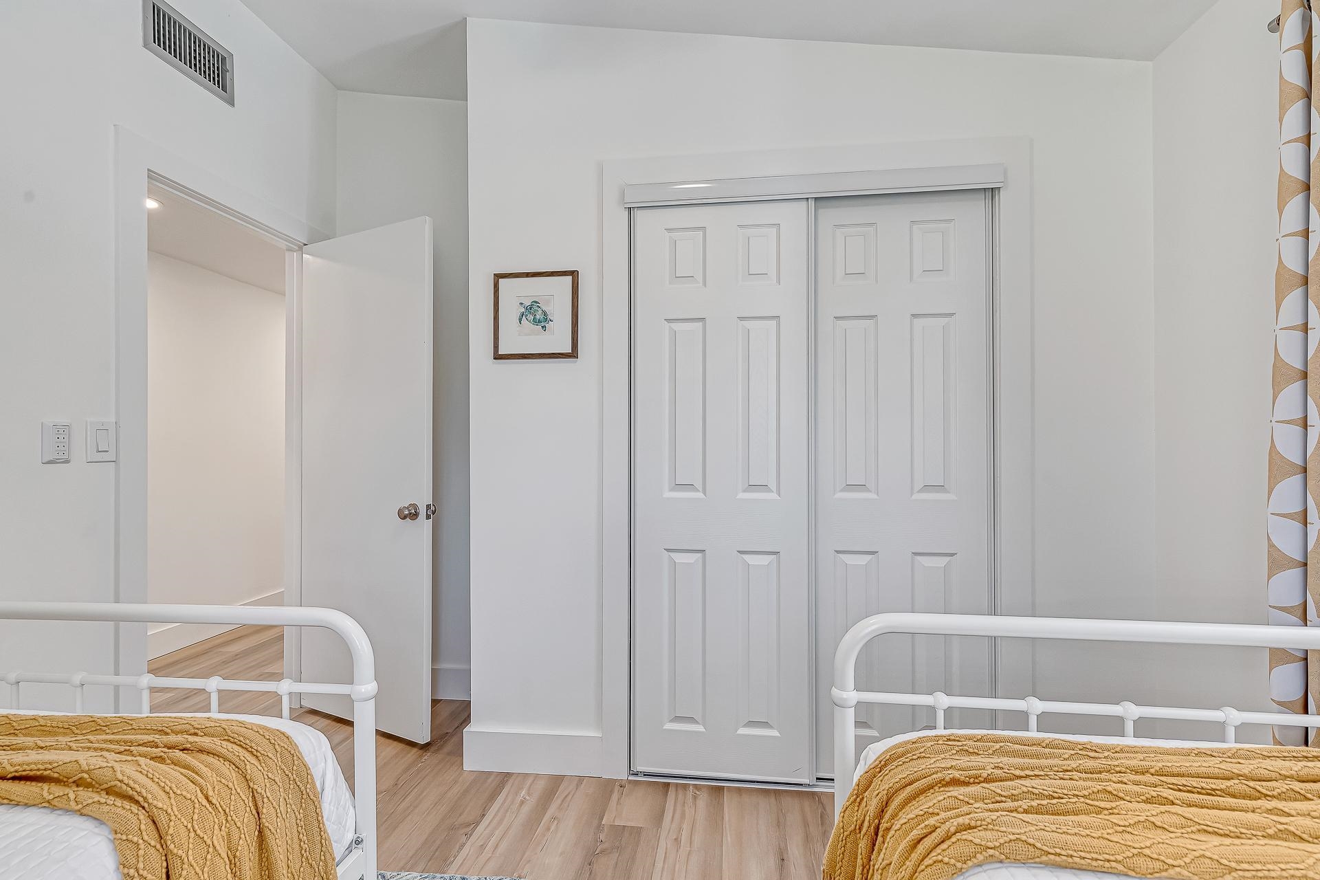 110 Terrapin Road St. Augustine, FL 32086 - Photo 25 of 46 a bedroom with a bed and a wooden floor