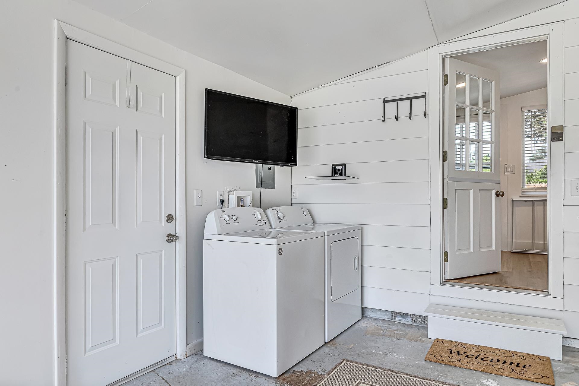 110 Terrapin Road St. Augustine, FL 32086 - Photo 27 of 46 a utility room with dryer and washer