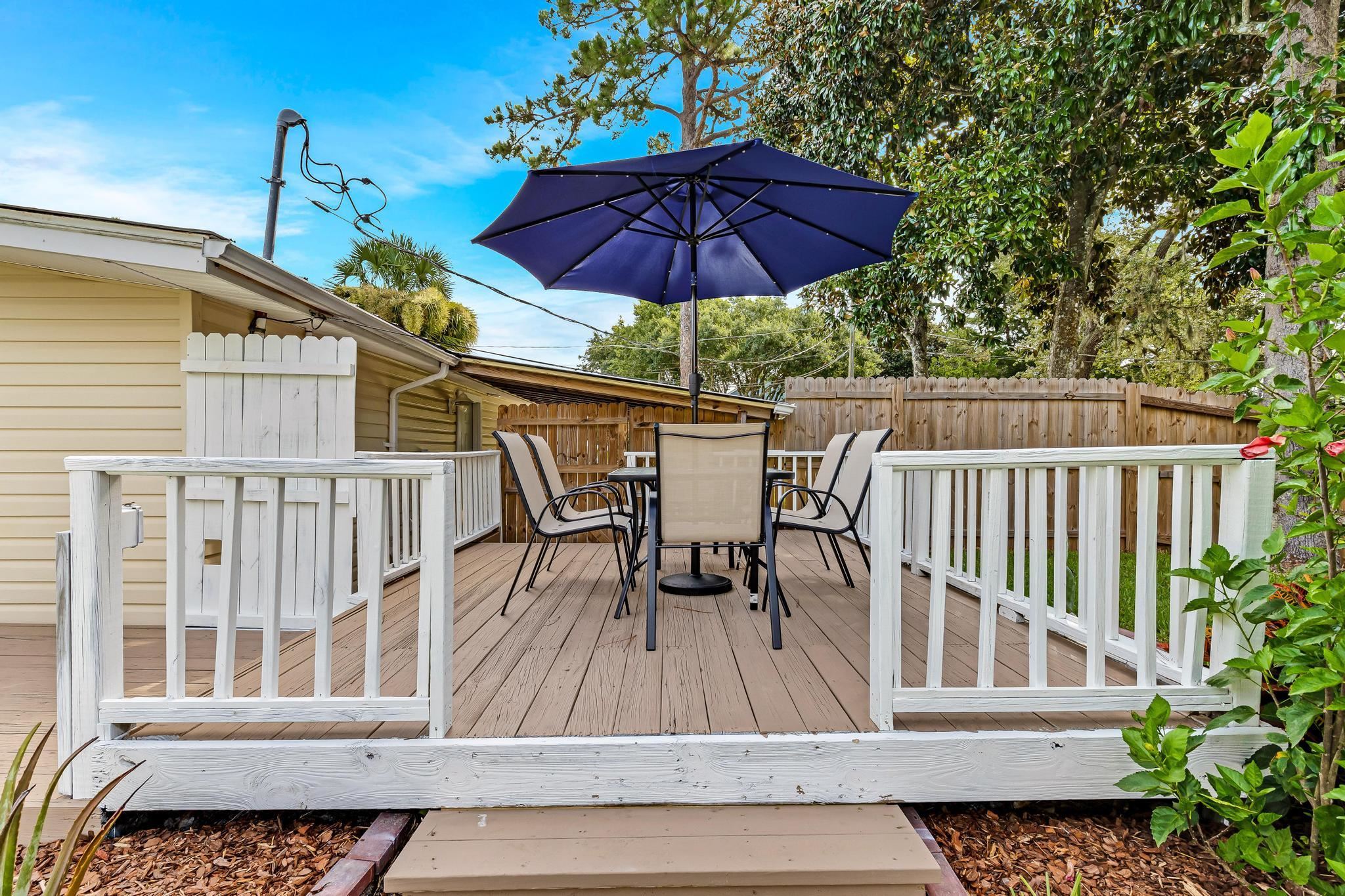 110 Terrapin Road St. Augustine, FL 32086 - Photo 41 of 46 a view of balcony with outdoor seating and wooden floor