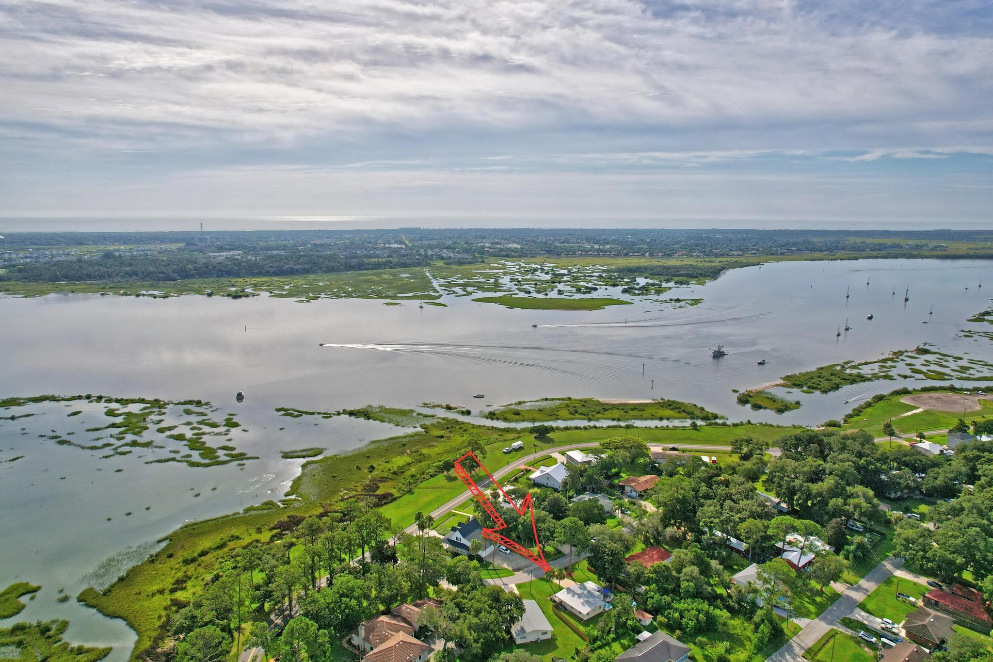 110 Terrapin Road St. Augustine, FL 32086 - Photo 46 of 46 a view of a lake with a beach