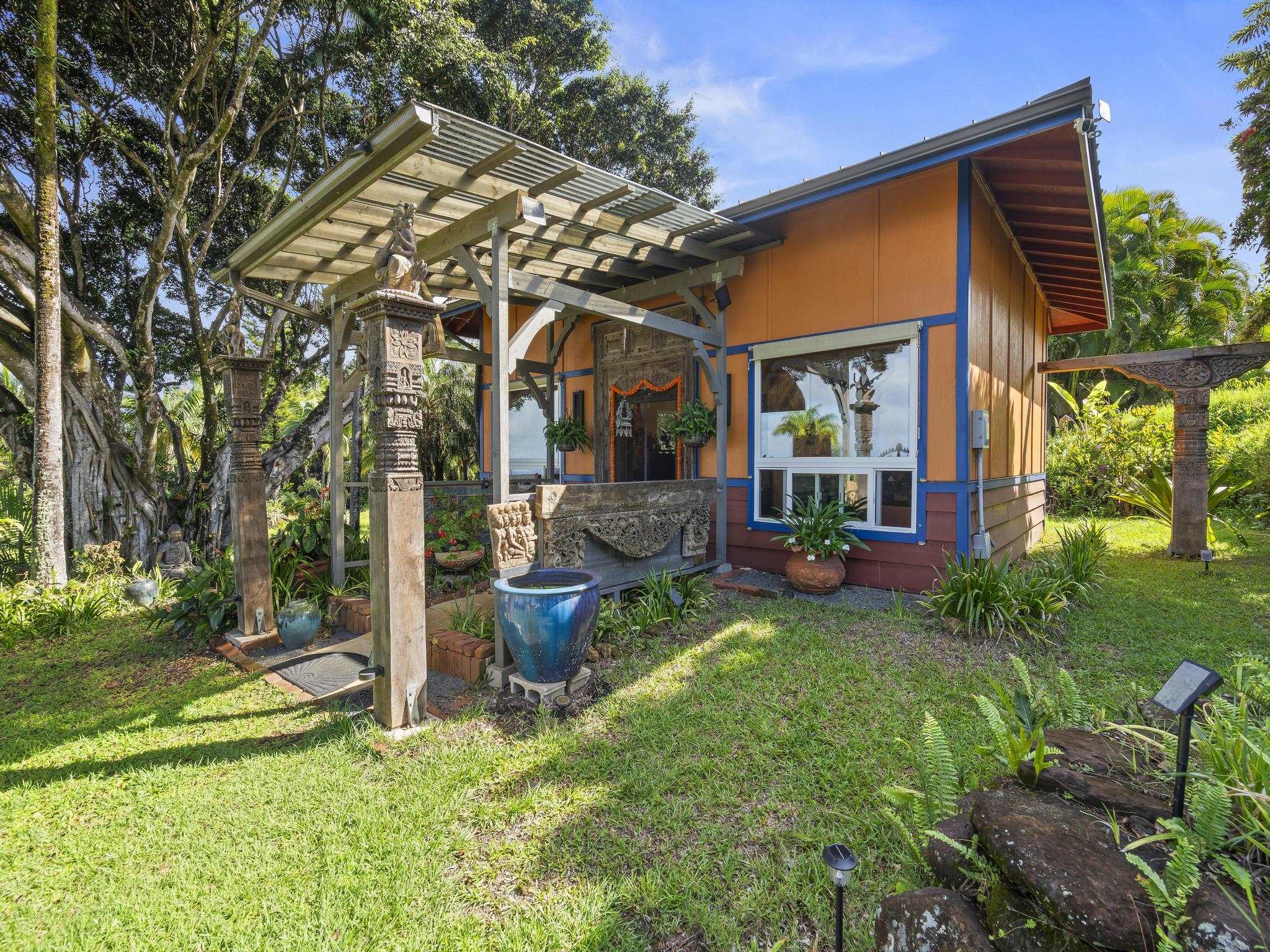 245 North Honokala Road, Unit A Haiku, HI 96708 - Photo 13 of 36 a view of a house with backyard porch and sitting area