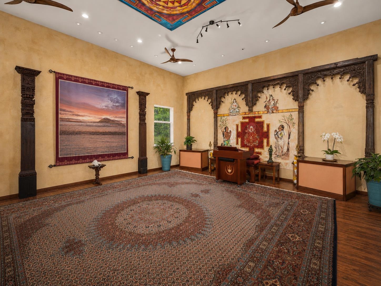 245 North Honokala Road, Unit A Haiku, HI 96708 - Photo 14 of 36 a room with gym equipment and a large window