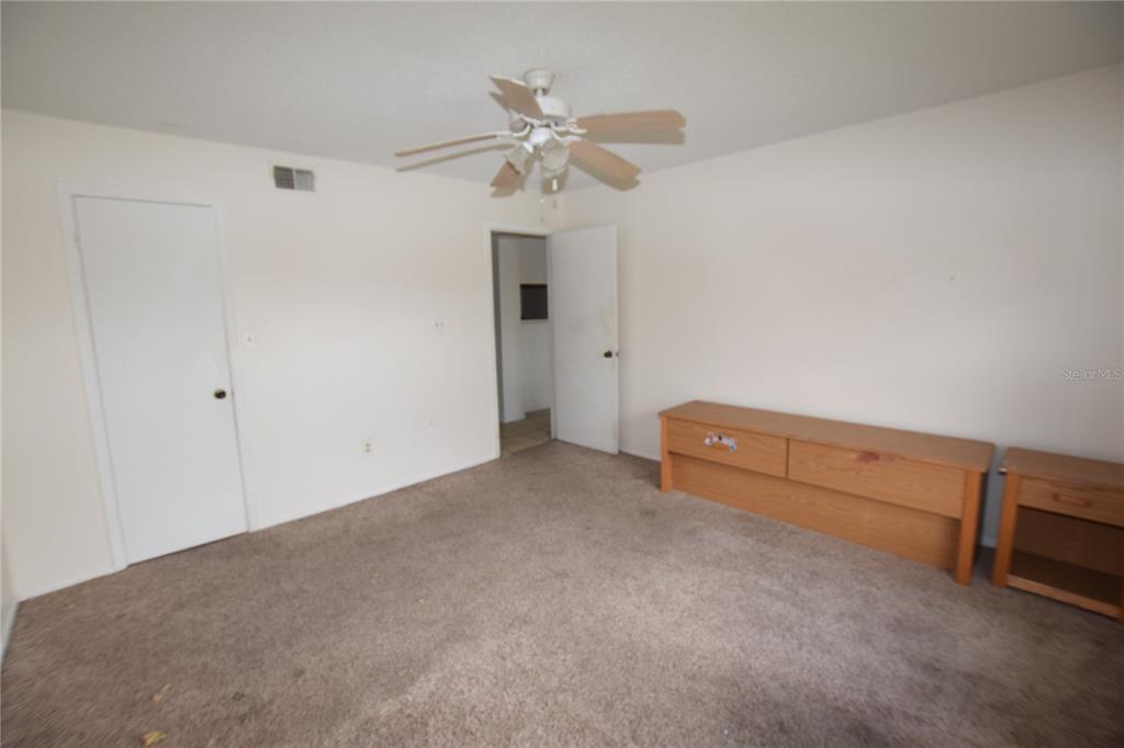 4659 Cason Cove Drive, Unit 3022 Orlando, FL 32811 - Photo 21 of 29 a view of an empty room