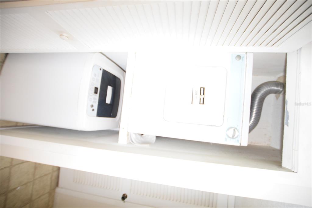 4659 Cason Cove Drive, Unit 3022 Orlando, FL 32811 - Photo 26 of 29 a picture of a room with a window