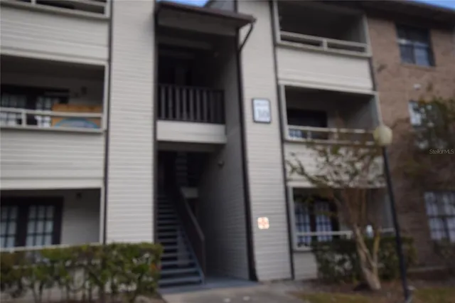 a childrens park with lots of swings and slides