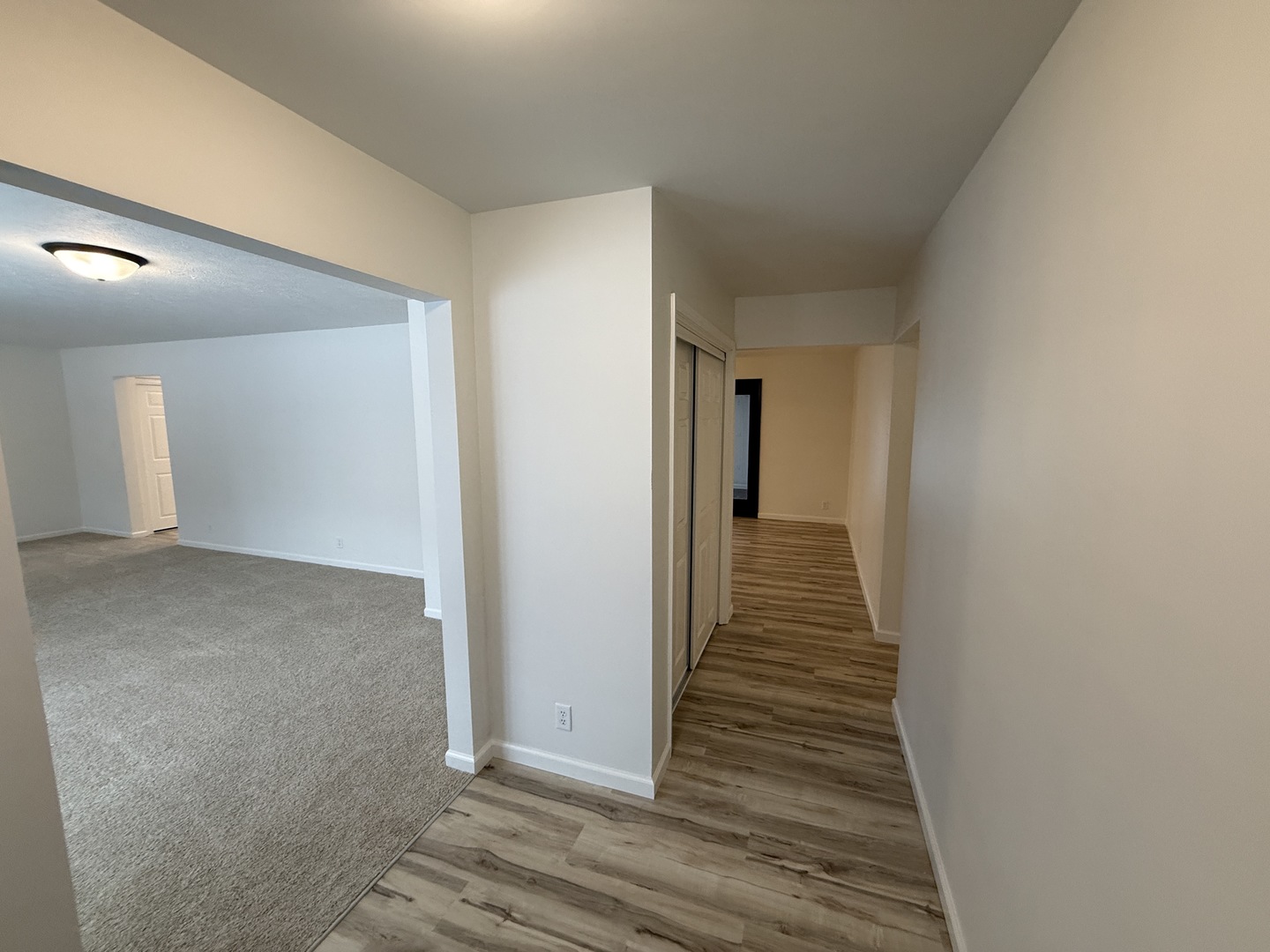 185 Jacqueline Street Morris, IL 60450 - Photo 3 of 19 a view of a hallway with wooden floor