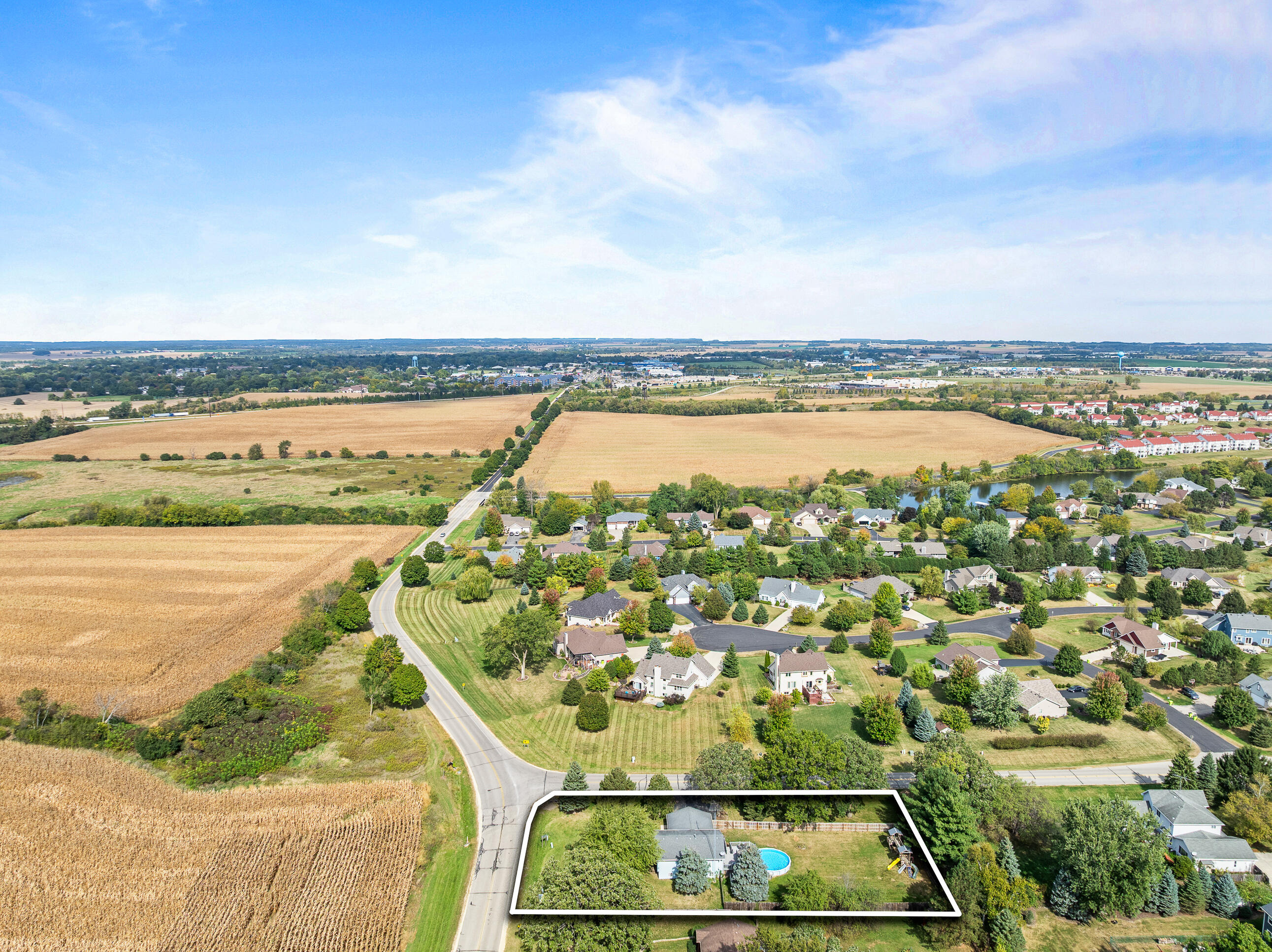 2212 Borg Road Delavan, WI 53115 - Photo 13 of 15 Drone perspective highlighting the property's proximity to shopping and the surrounding countryside.
