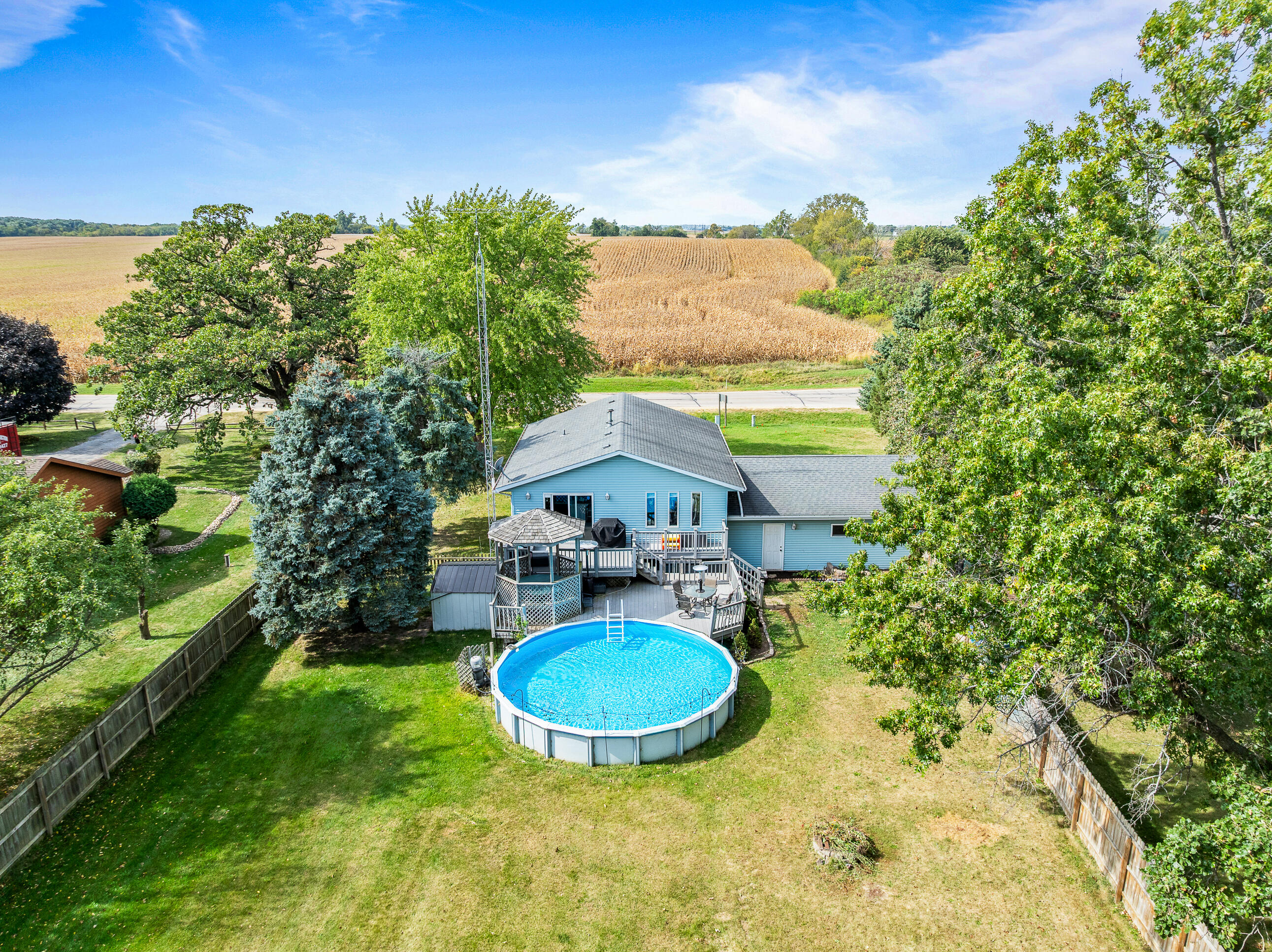 2212 Borg Road Delavan, WI 53115 - Photo 6 of 15 Overhead angle showcasing the backyard oasis, pool, gazebo, and deck layout.