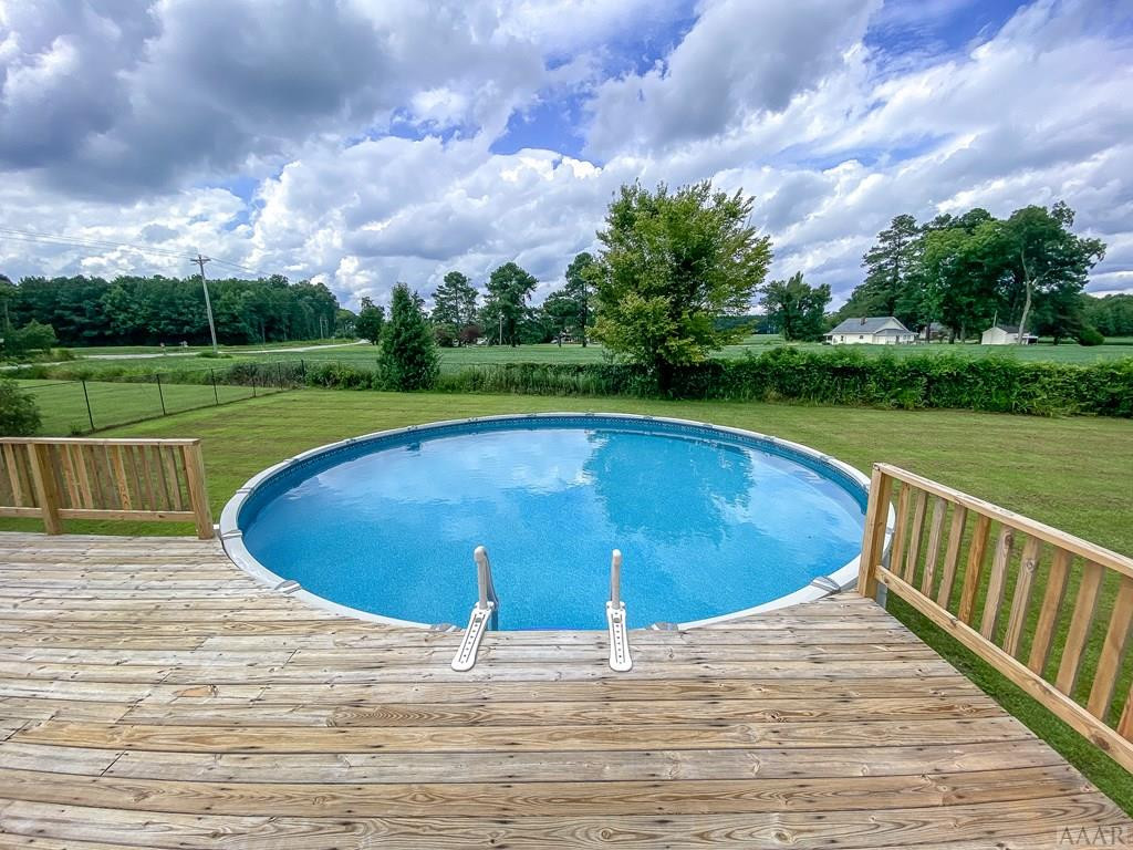 1164 Swamp Road Hertford, NC 27944 - Photo 33 of 42 Above ground pool and deck