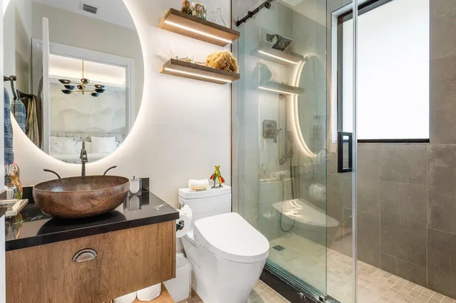 a bathroom with a toilet and a sink