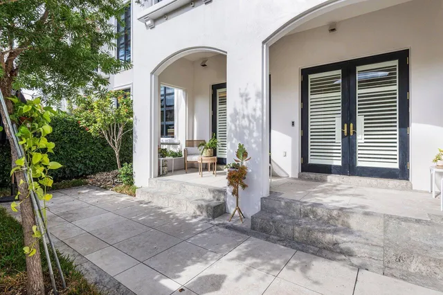 a view of entryway and hall with a yard