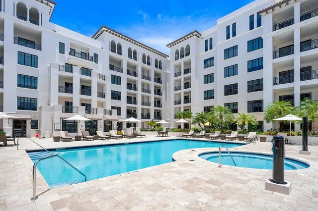 a view of pool with outdoor seating