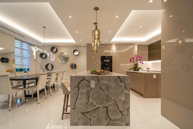 a kitchen with a table and chairs