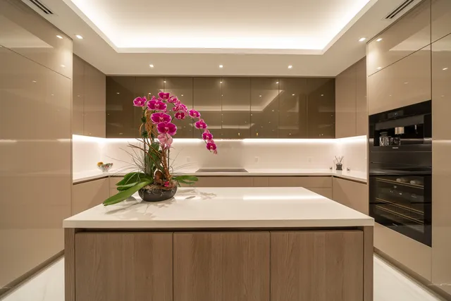 a kitchen with a sink and cabinets