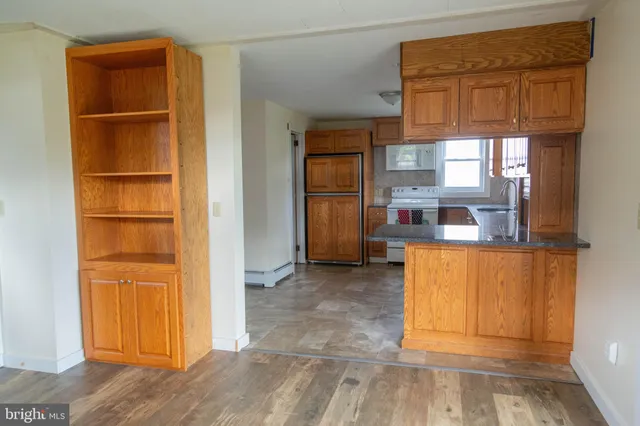 a view of kitchen and utility room