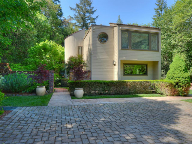 5500 Alpine Road Portola Valley, CA 94028 - Photo 1 of 24 a front view of a house with garden