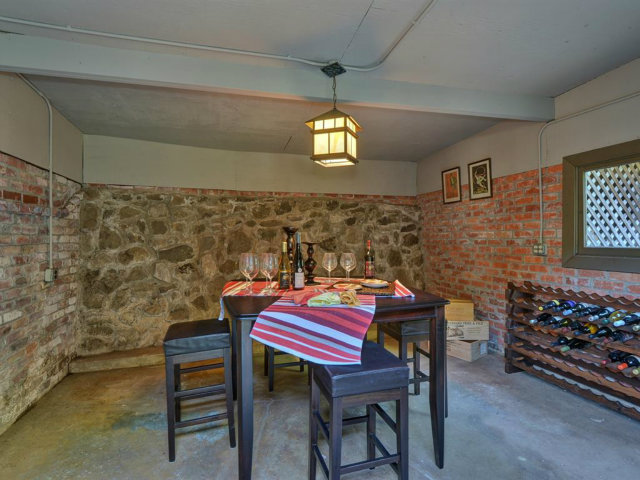 5500 Alpine Road Portola Valley, CA 94028 - Photo 23 of 24 a room with a table chairs and a kitchen view