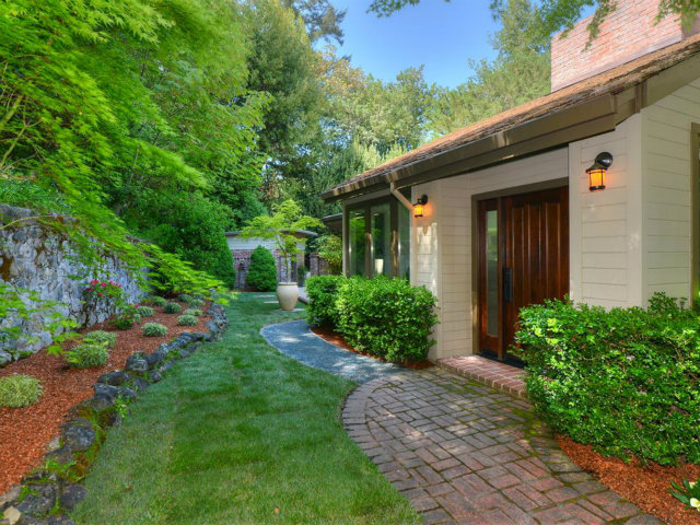 5500 Alpine Road Portola Valley, CA 94028 - Photo 3 of 24 a front view of a house with garden