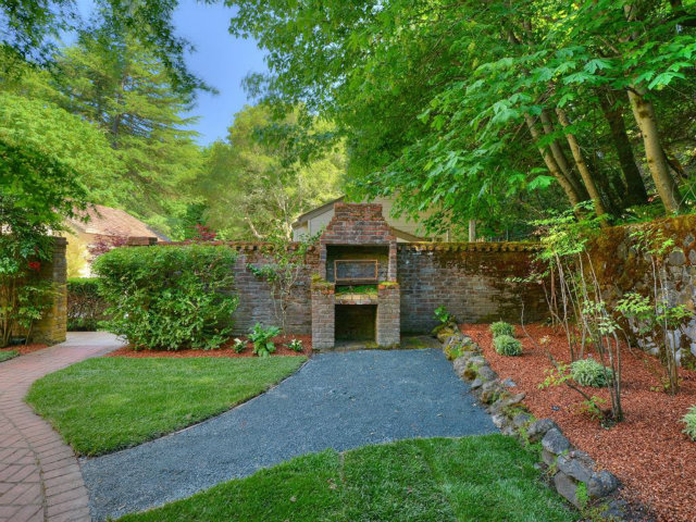 5500 Alpine Road Portola Valley, CA 94028 - Photo 4 of 24 a front view of a house with a garden