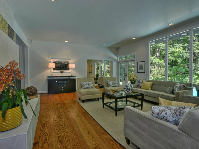 5500 Alpine Road Portola Valley, CA 94028 - Photo 10 of 24 a living room with furniture and a flat screen tv