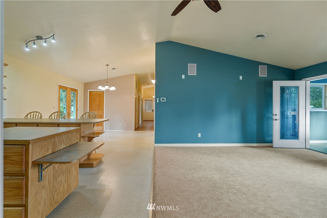 7625 187th Avenue Southwest Rochester, WA 98579 - Photo 11 of 38 a view of a livingroom with furniture and windows