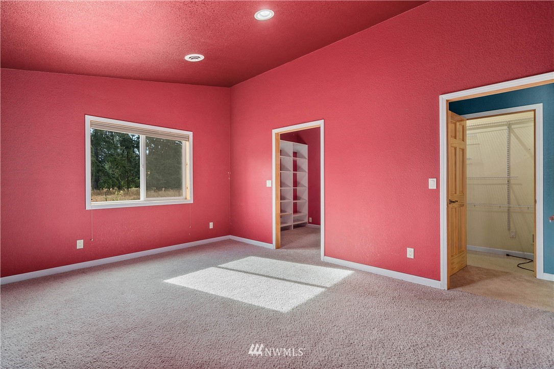 7625 187th Avenue Southwest Rochester, WA 98579 - Photo 14 of 38 a empty room with windows