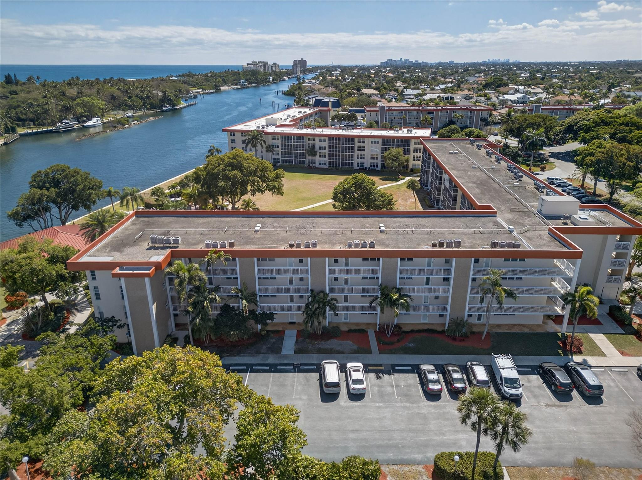 3150 Northeast 48th Court, Unit 414 Lighthouse Point, FL 33064 - Photo 3 of 33 an aerial view of a house with lake view