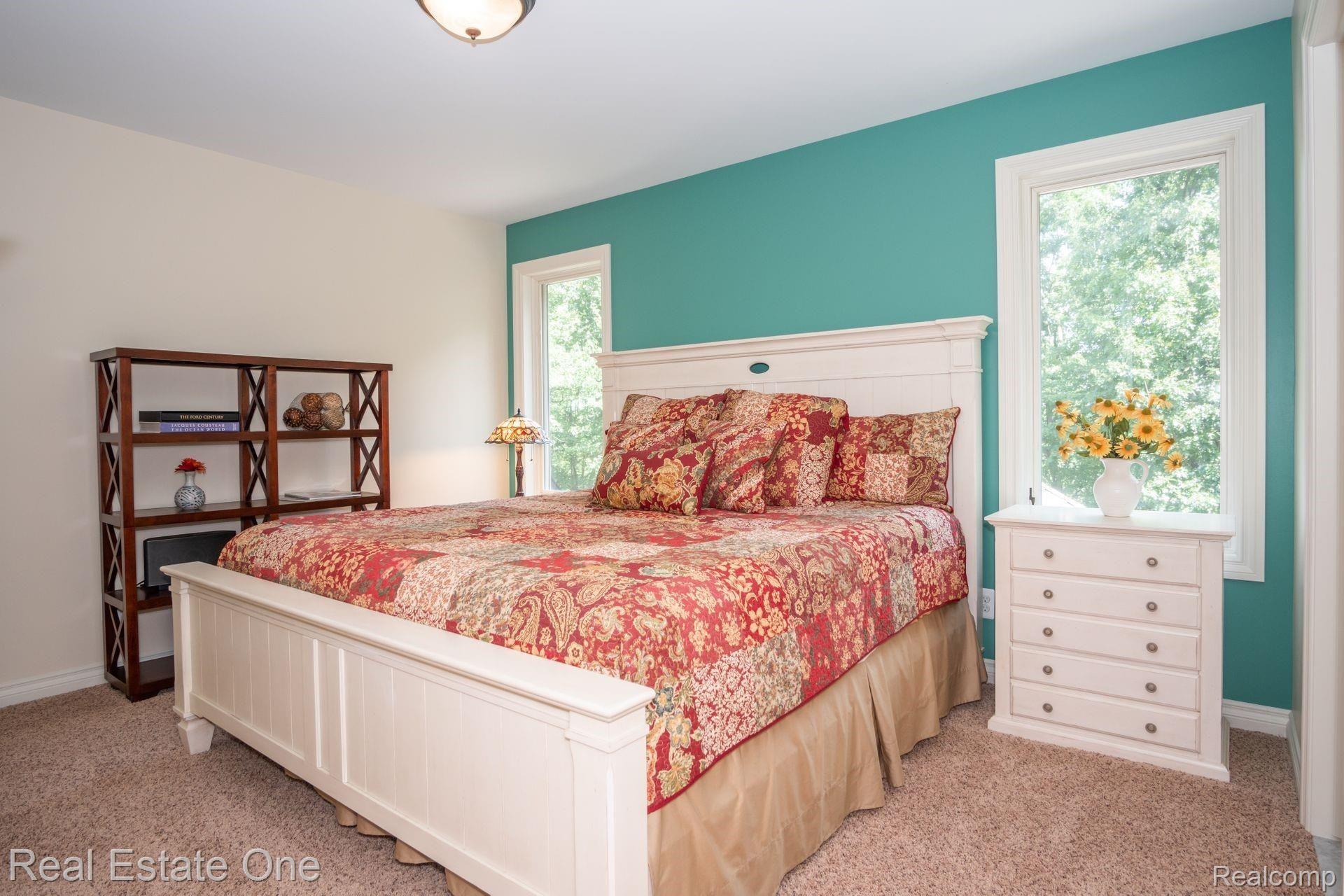 9091 Northpointe Ridge Brighton, MI 48114 - Photo 34 of 56 Guest bedroom with awesome views.