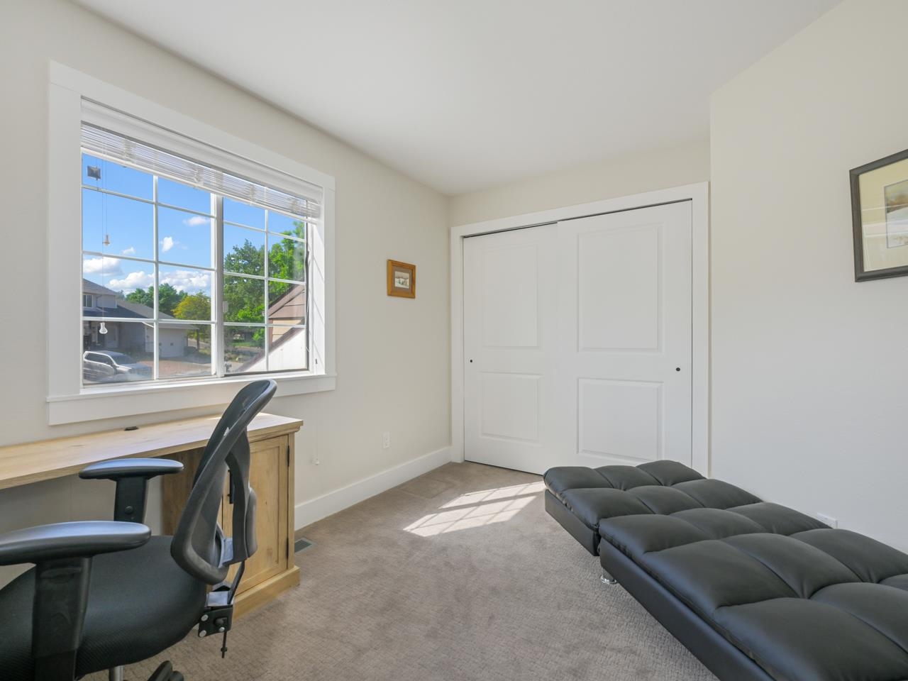 383 Explorer Court, Unit B Grand Junction, CO 81507 - Photo 29 of 40 a living room with furniture and a window