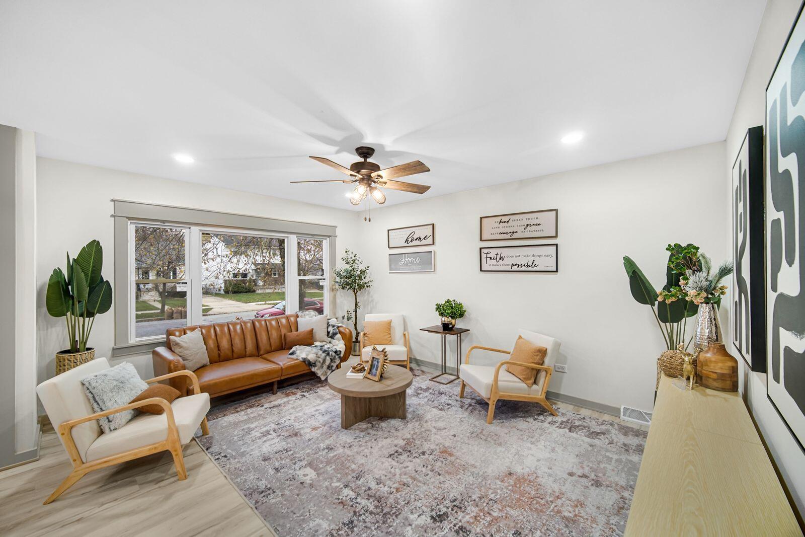 7405 South McCook Avenue Hammond, IN 46323 - Photo 3 of 28 a living room with furniture and a potted plant