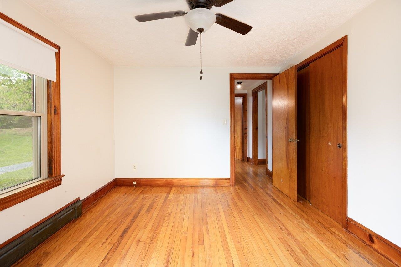 547 Grindstone Road Bridgewater, VA 22812 - Photo 16 of 57 a view of empty room with wooden floor