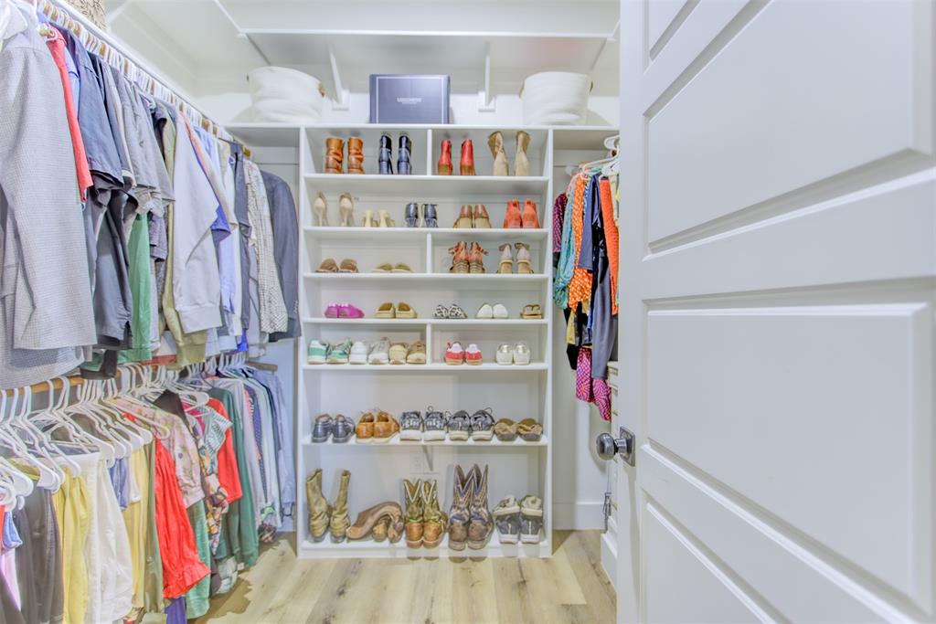 550 Capstone Rdg Road Santo, TX 76472 - Photo 15 of 40 Spacious closet with wood finished floors