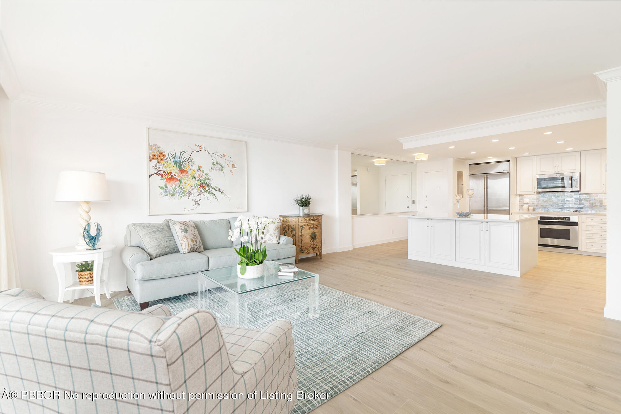 354 Chilean Avenue, Unit 6C Palm Beach, FL 33480 - Photo 6 of 21 a living room with furniture and kitchen view