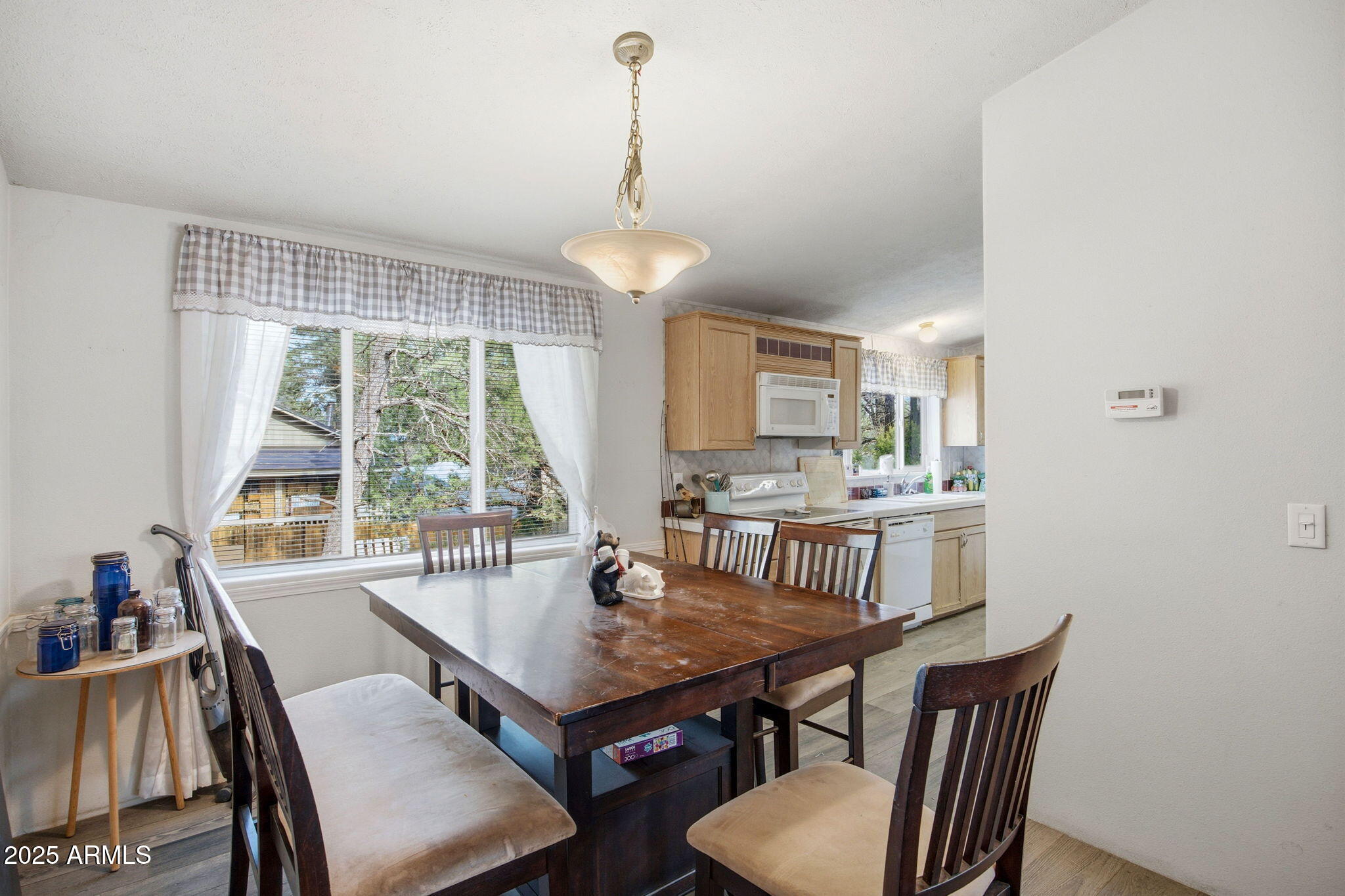 2190 Wildlife Trail Overgaard, AZ 85933 - Photo 9 of 34 a view of a dining room with furniture window and outside view