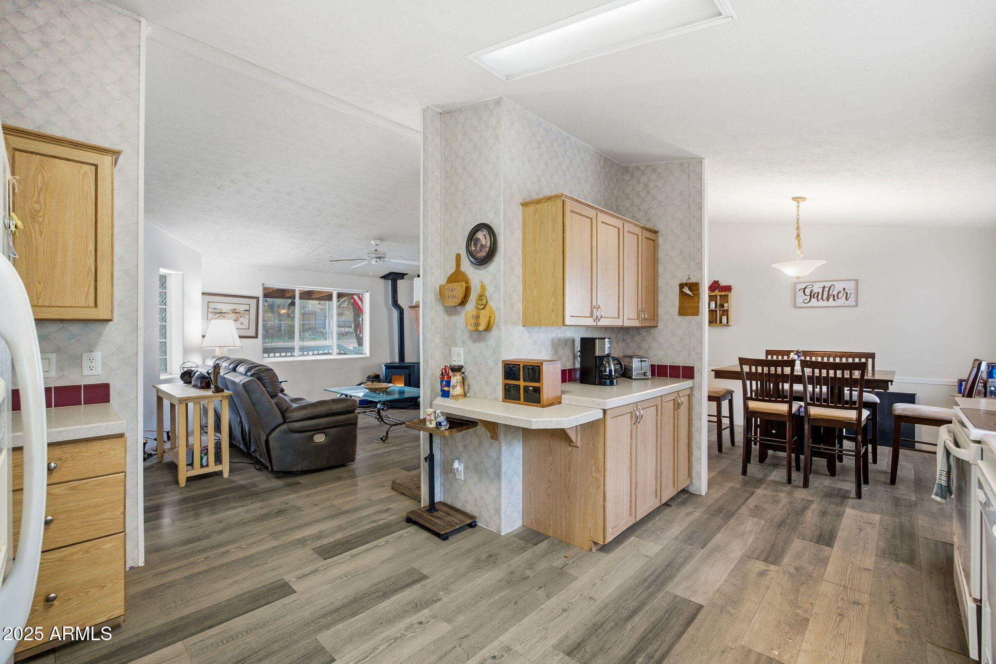 2190 Wildlife Trail Overgaard, AZ 85933 - Photo 12 of 34 a view of kitchen with sink and wooden floor