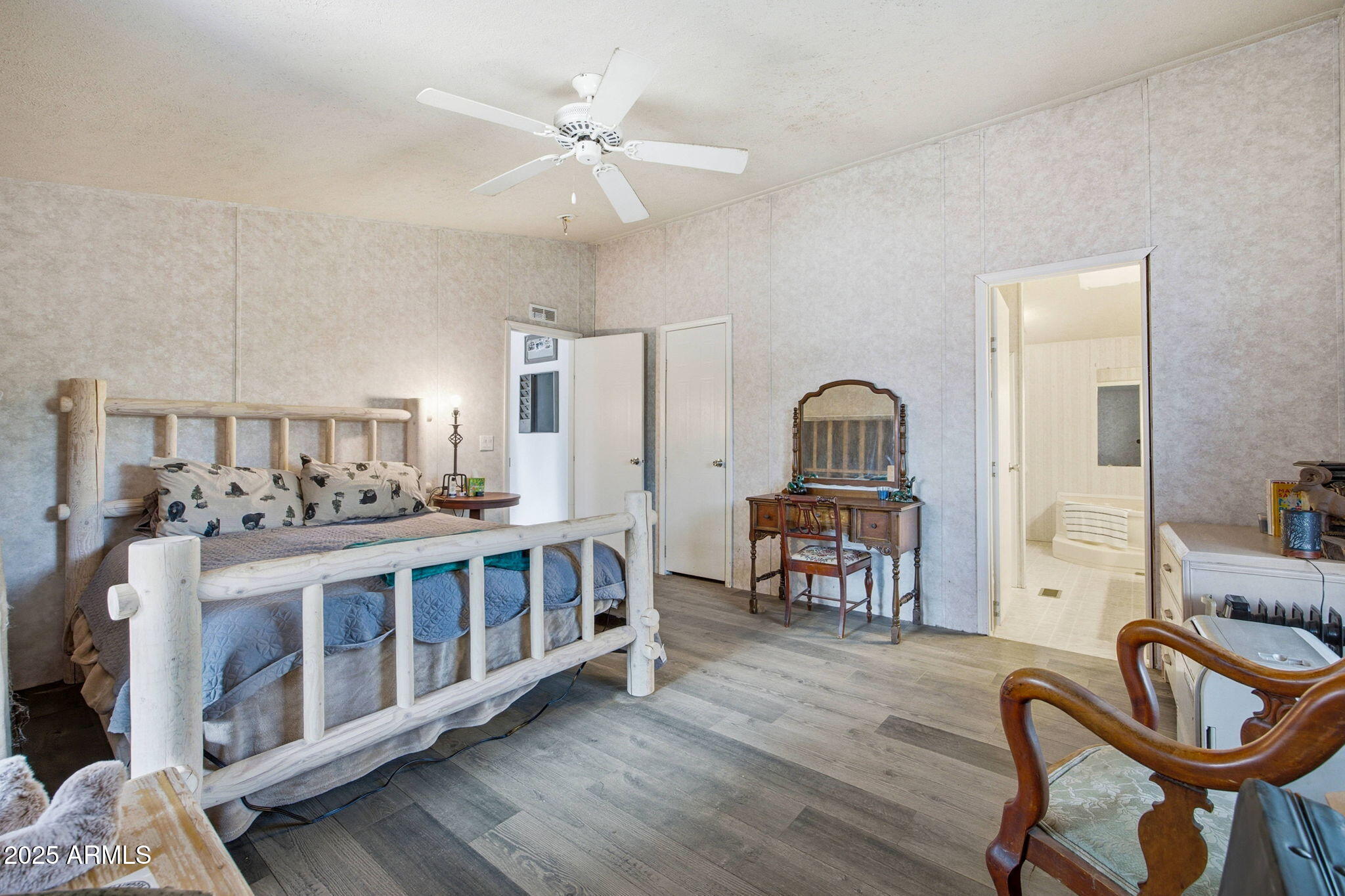 2190 Wildlife Trail Overgaard, AZ 85933 - Photo 15 of 34 a living room with furniture and a wooden floor