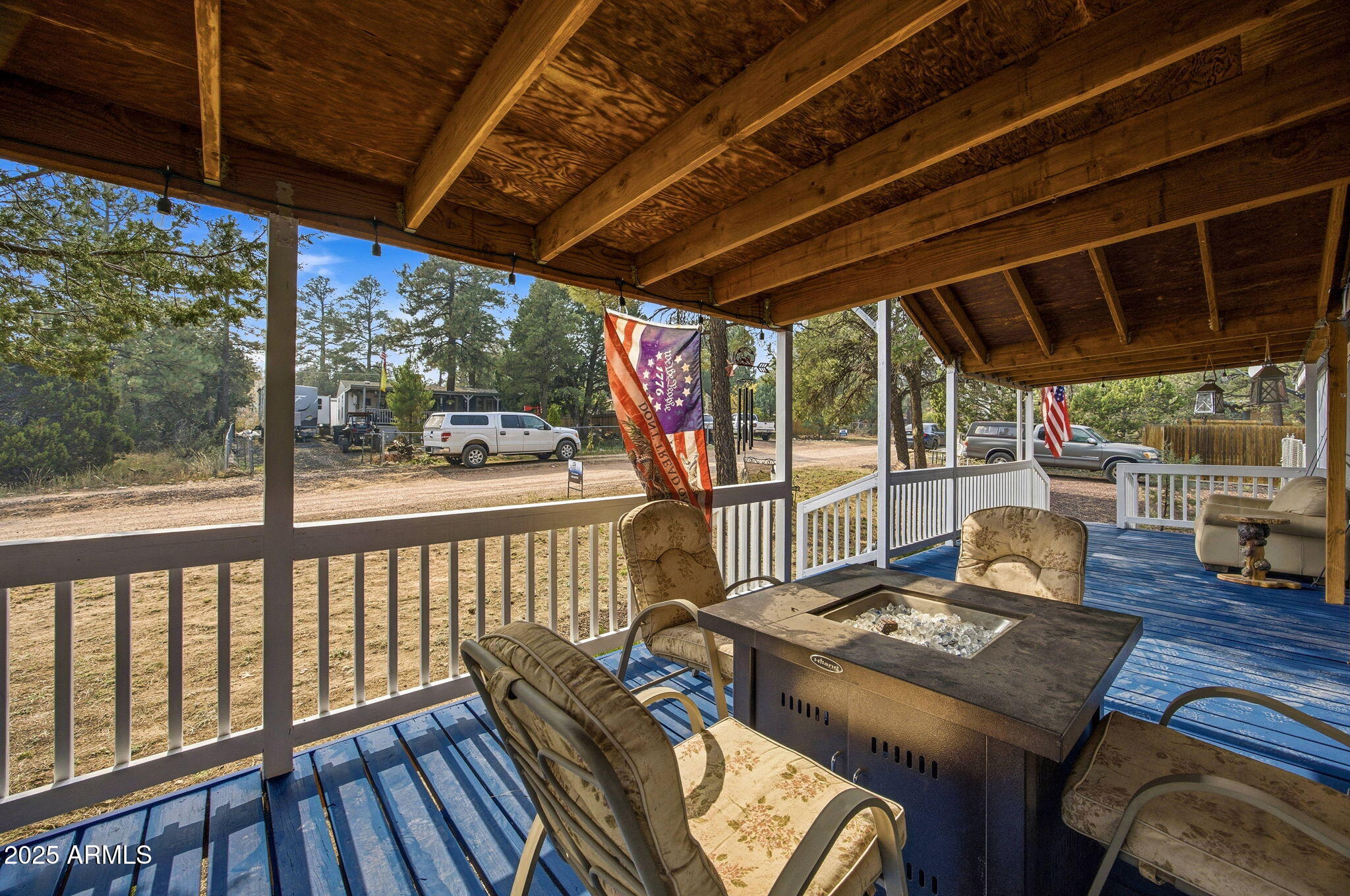 2190 Wildlife Trail Overgaard, AZ 85933 - Photo 4 of 34 a view of a patio with wooden floor