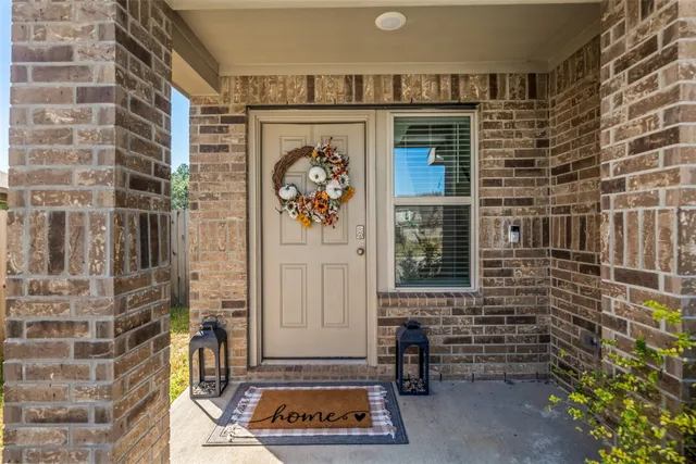 a front view of a house with a door
