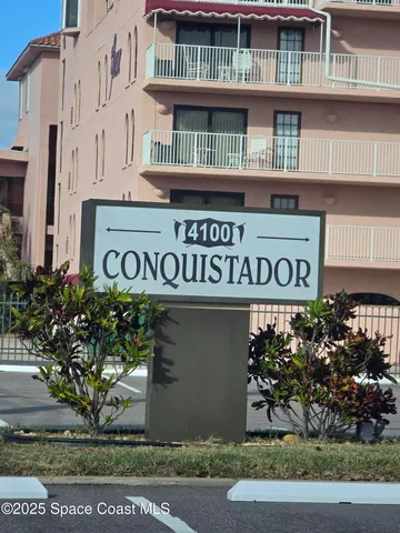 a sign that is on the side of a building