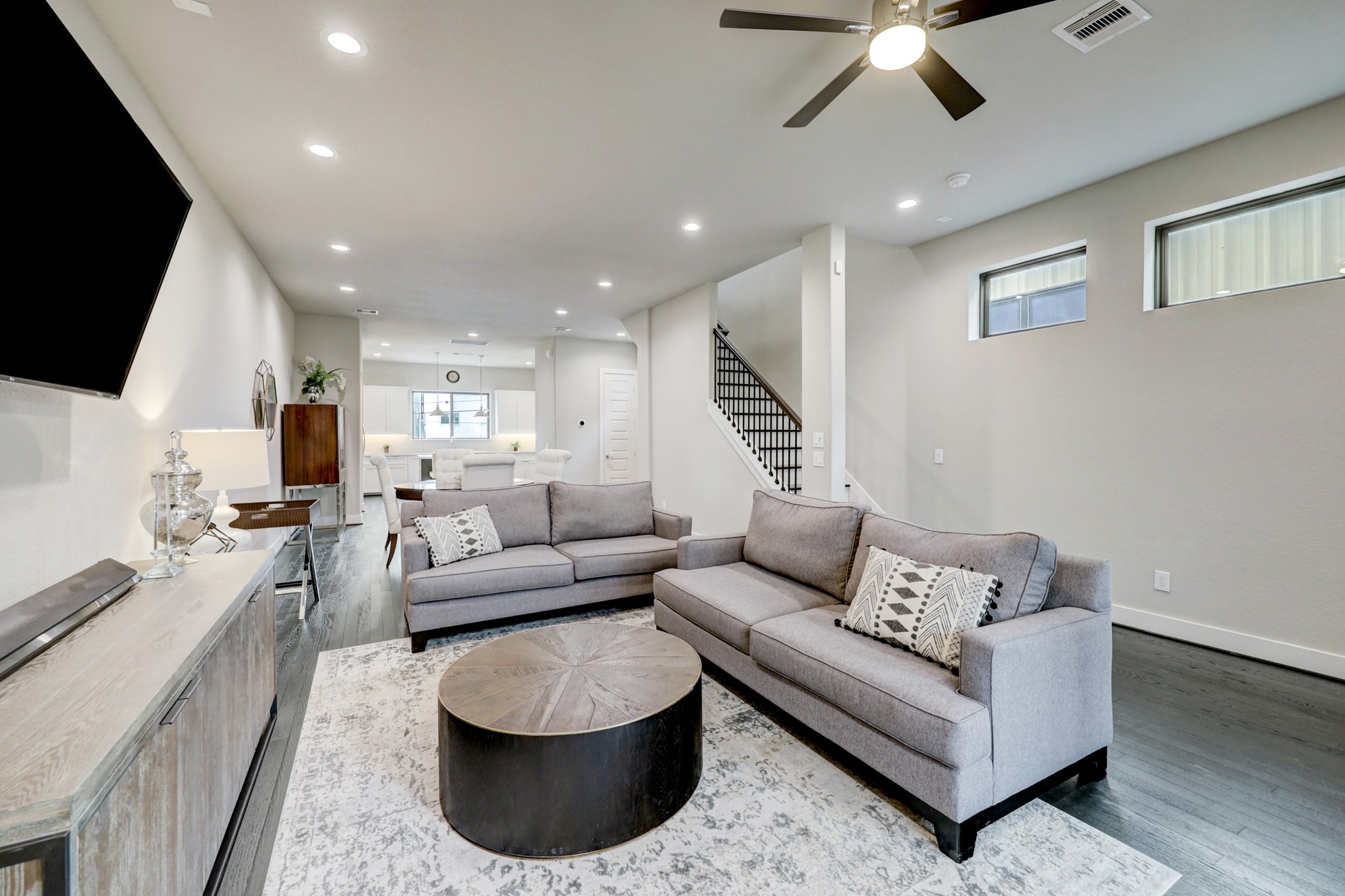 4203 Allen Street Houston, TX 77007 - Photo 12 of 35 a living room with furniture and a flat screen tv