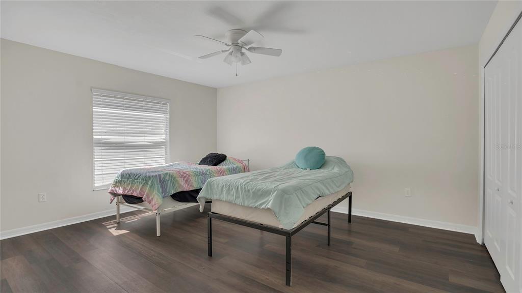 545 Fairhaven Drive Davenport, FL 33837 - Photo 14 of 23 a view of a workspace with furniture and wooden floor