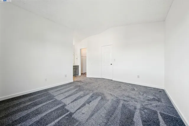 a bathroom with a sink vanity and a mirror