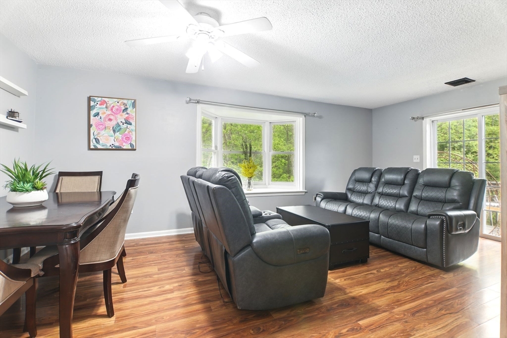 59 Castlegate Drive, Unit B Springfield, MA 01129 - Photo 13 of 42 a living room with furniture and a large window