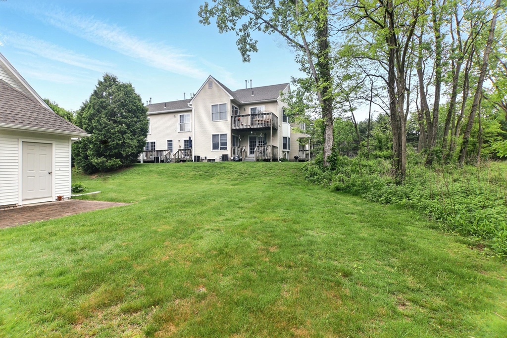 59 Castlegate Drive, Unit B Springfield, MA 01129 - Photo 40 of 42 a house view with a garden space