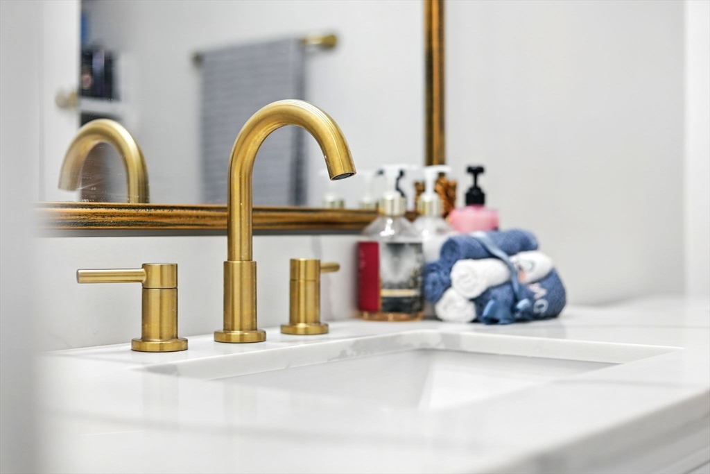 59 Castlegate Drive, Unit B Springfield, MA 01129 - Photo 6 of 42 a picture of a bathroom with a sink