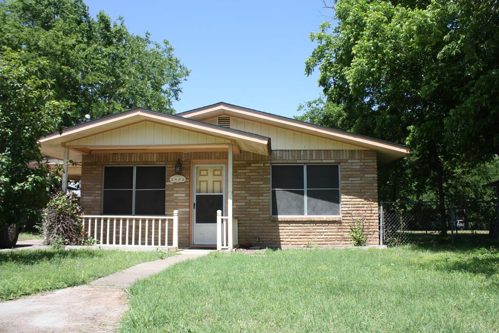 2802 Nichols Street Kerrville, TX 78028 - Photo 1 of 1 a front view of a house with garage