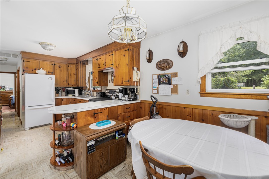 226 Westcott Road Scituate, RI 02857 - Photo 20 of 48 An open kitchen with adjacent dining/sitting area